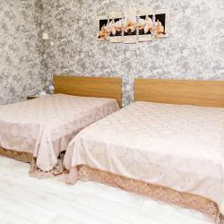 Номер люкс с 2 двуспальными кроватями