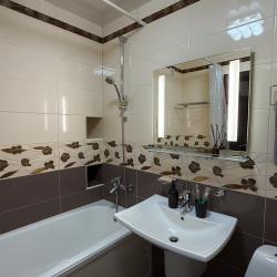 Фото Отель Уютная, новая однокомнатная квартира в центре города а