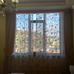 Номер стандарт с 1 двуспальной кроватью c боковым видом на море