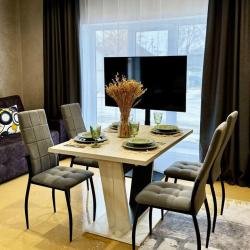 4-местный номер делюкс с 1 двуспальной кроватью