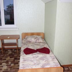 Номер улучшенный стандарт с 4 односпальными и 1 двуспальной кроватью