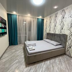 Фото Апартаменты Happy Home(ХэппиХоум) на улице Зураба Магкаева 83/3