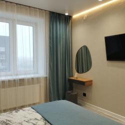 Фото Отель Современная двухкомнатная квартира с кухней-гостиной