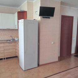 Фото Отель Уютная студия на улице Карпенко 4В