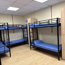 Кровать в 10-местном общем номере