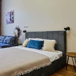 Фото Отель FlatStay Мойки 82| Трёшка у Исаакиевского собора в стиле Лофт, с просторной гостиной и 2-м ярусом