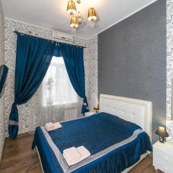 Комната студио с кроватью размера «king-size» и диван-кроватью