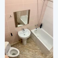 Фото Апартаменты на улице Строителей 7А корпус 1