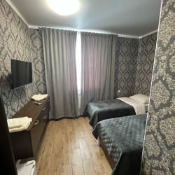 Номер люкс с 2 односпальными кроватями