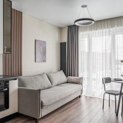 Фото Апартаменты V GОSТIАН U NАSТI на улице Академика Ландау 9