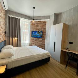 Фото Отель В Гости на Запорожской 69