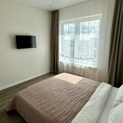 Фото Уютные апартаменты на улице Машарова 4