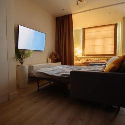 Фото Апартаменты на улице Ивана Захарова 17