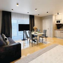 4-местный номер делюкс с 1 двуспальной кроватью