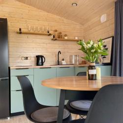 Фото Отель Коттеджи МатрёшкаHOME (Хоум)