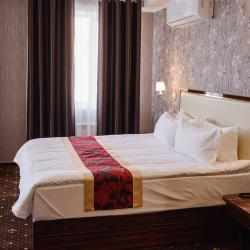 Номер полулюкс улучшенный с 1 двуспальной кроватью (с завтраком) #202