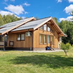 Фото Отель Коттедж А2 на базе отдыха Новинки Парк