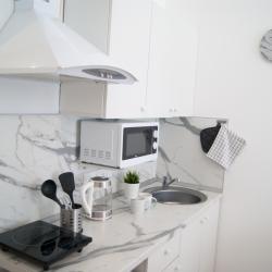 Фото Отель Сеть гостевых квартир на улице Ситникова 6