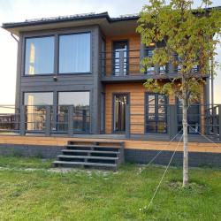 Фото Отель Дом в ТСН Гринвуд 50С