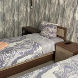 Номер стандарт с 2 односпальными кроватями (удобства на этаже)