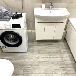 Фото Отель Romlex Apartments (Ромлекс) на улице Героев Сталинградской битвы 9