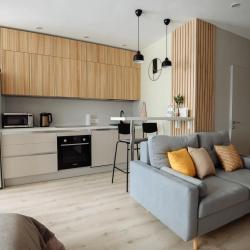 Фото Апартаменты на улице Ивана Захарова 17