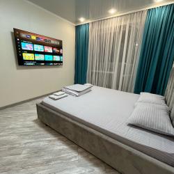 Фото Апартаменты Happy Home(ХэппиХоум) на улице Зураба Магкаева 83/3