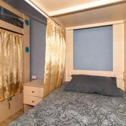 Кровать в 10-местном общем номере