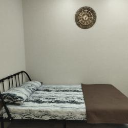 Фото Отель Современная двухкомнатная квартира с кухней-гостиной