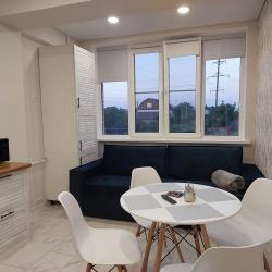 Фото Апартаменты СуткиРу на улице Просторная 36 корпус 8