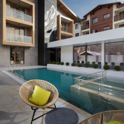 Фото Отель Ikos Polyana