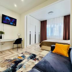 Фото Апартаменты на улице Октябрьская 181/2 корпус 3