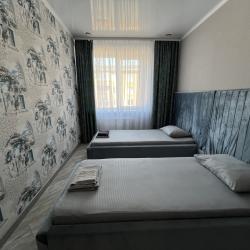 Фото Апартаменты Happy Home(ХэппиХоум) на улице Зураба Магкаева 83/3