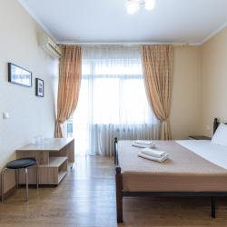 Комната стандарт с 1 двуспальной кроватью и балконом
