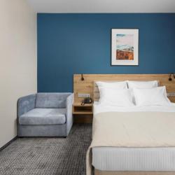 Фото Отель Ikos Polyana