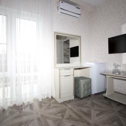 Номер комфорт с 1 односпальной и 1 двуспальной кроватью