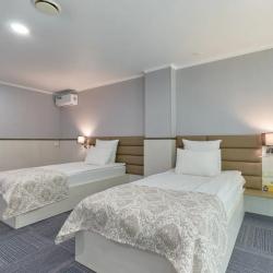 Номер стандарт с 2 односпальными кроватями для людей с ограниченными возможностями (без окна)