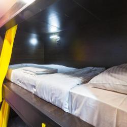 Кровать в общем женском номере с 2 двухъярусными кроватями (удобства общие)