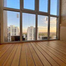 Фото Отель Новая квартира с кроватью возле панорамного окна, высокий этаж