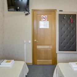 Номер эконом стандарт с двумя раздельными кроватями (удобства на этаже)