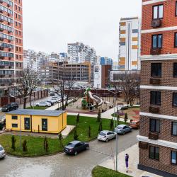 Фото Отель Уютная студия в ЖК «Аpeна» от LеtоAрart