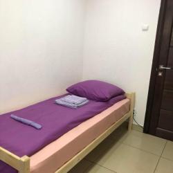 Кровать в 3-местном женском номере с 1 двухъярусной и 1 односпальной кроватью (удобства на этаже)