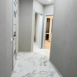 Фото Апартаменты на улице Ларина 45 строение 1