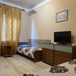 Номер стандарт комфорт с 1 односпальной и 1 двуспальной кроватью