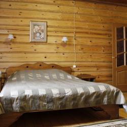 Двухместный номер в деревянном коттедже с сауной и камином