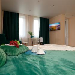 Фото Отель ApartmentFly (АпартментФлай) на улице Петра Ломако 14