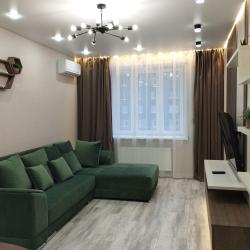 Фото Отель Современная двухкомнатная квартира с кухней-гостиной