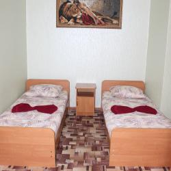 Номер улучшенный стандарт с 4 односпальными и 1 двуспальной кроватью