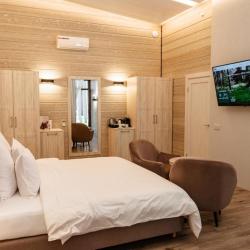 Фото Отель Охта Парк коттеджи