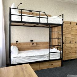 Кровать в 10-местном общем номере